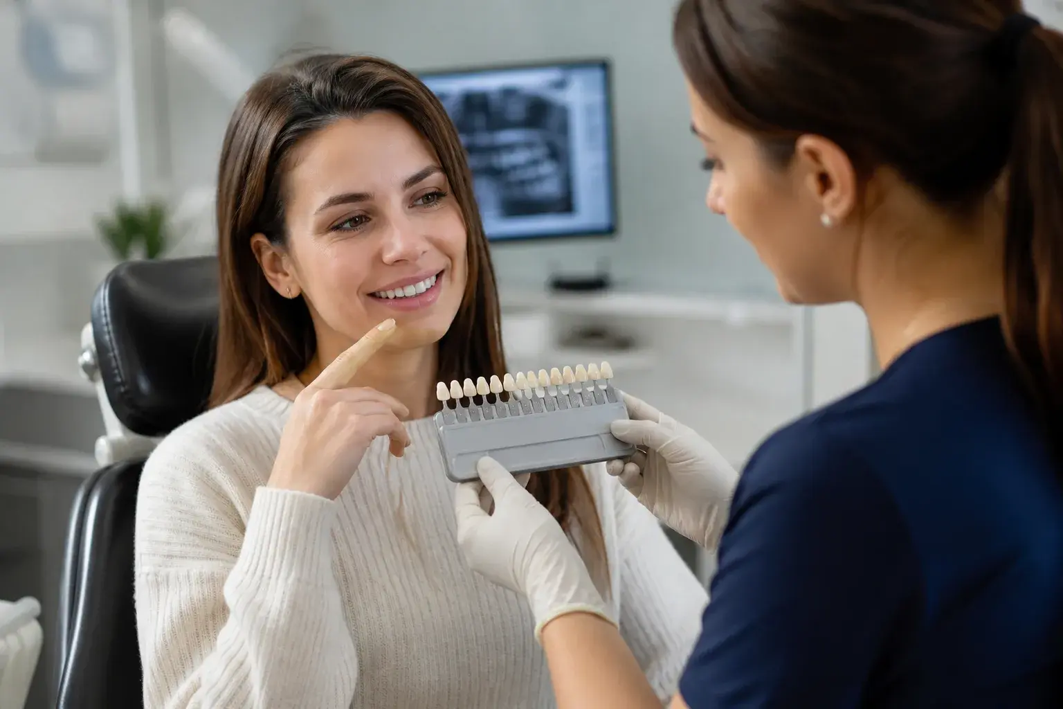Smile design wax-up and veneer samples showing how cosmetic veneers can visually improve crooked teeth