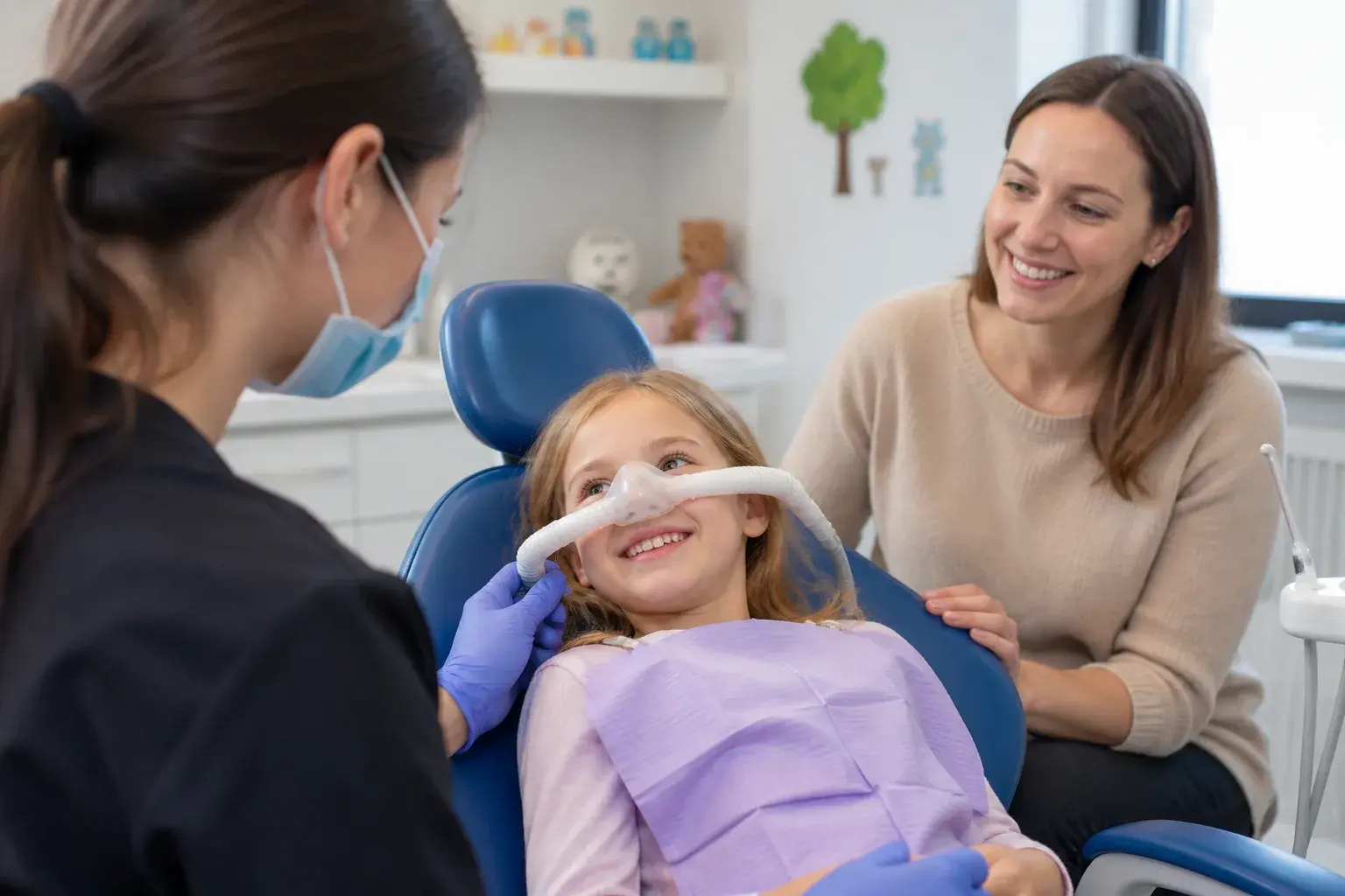 Child-sized sedation mask and monitoring equipment arranged for a calm pediatric dental visit