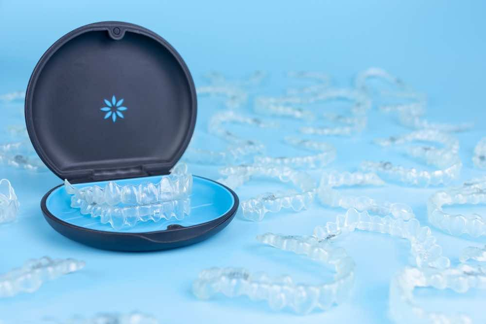 Can I play sports or musical instruments with clear aligners?