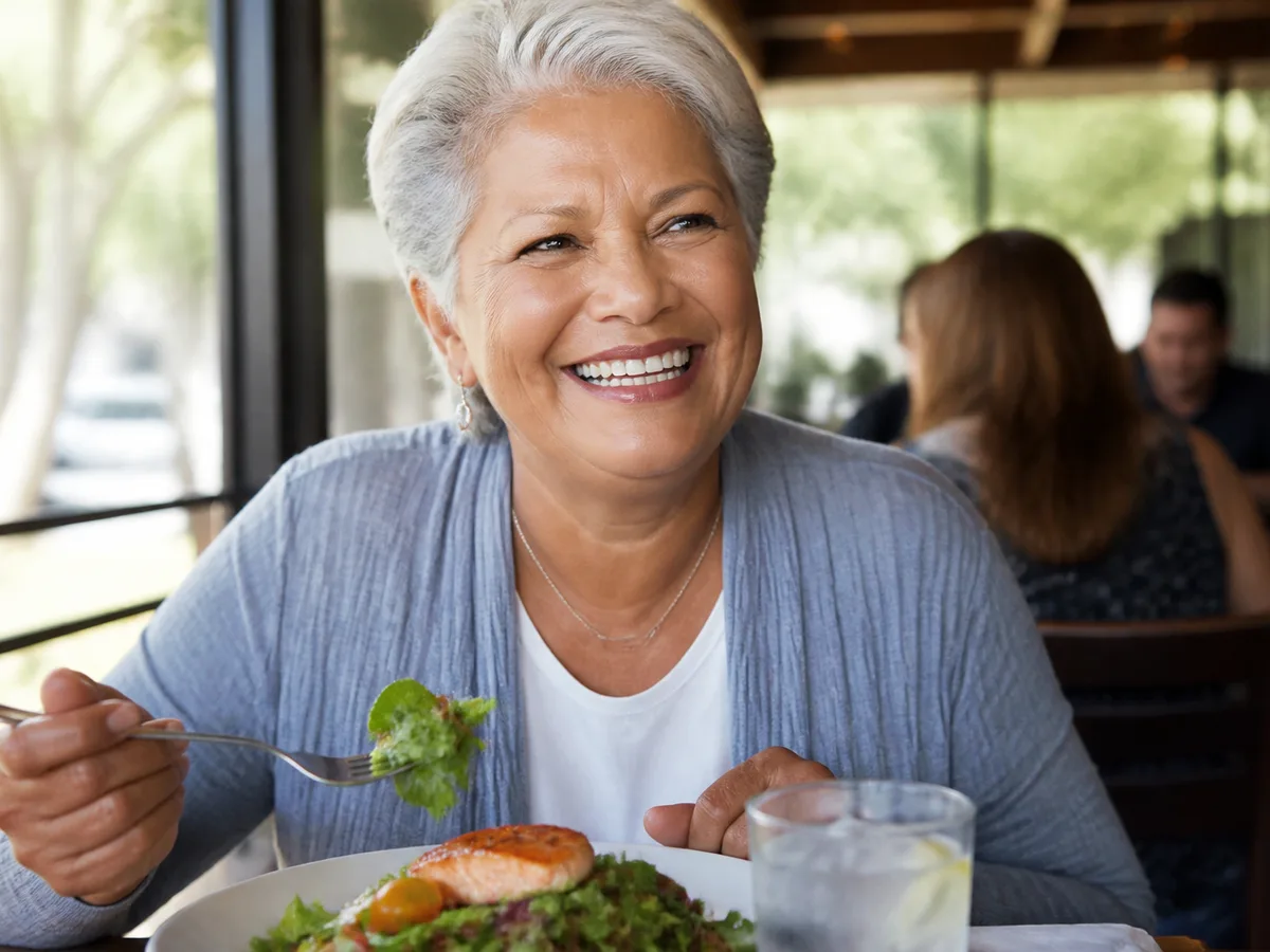 Denture patient enjoying a balanced meal after fit adjustments