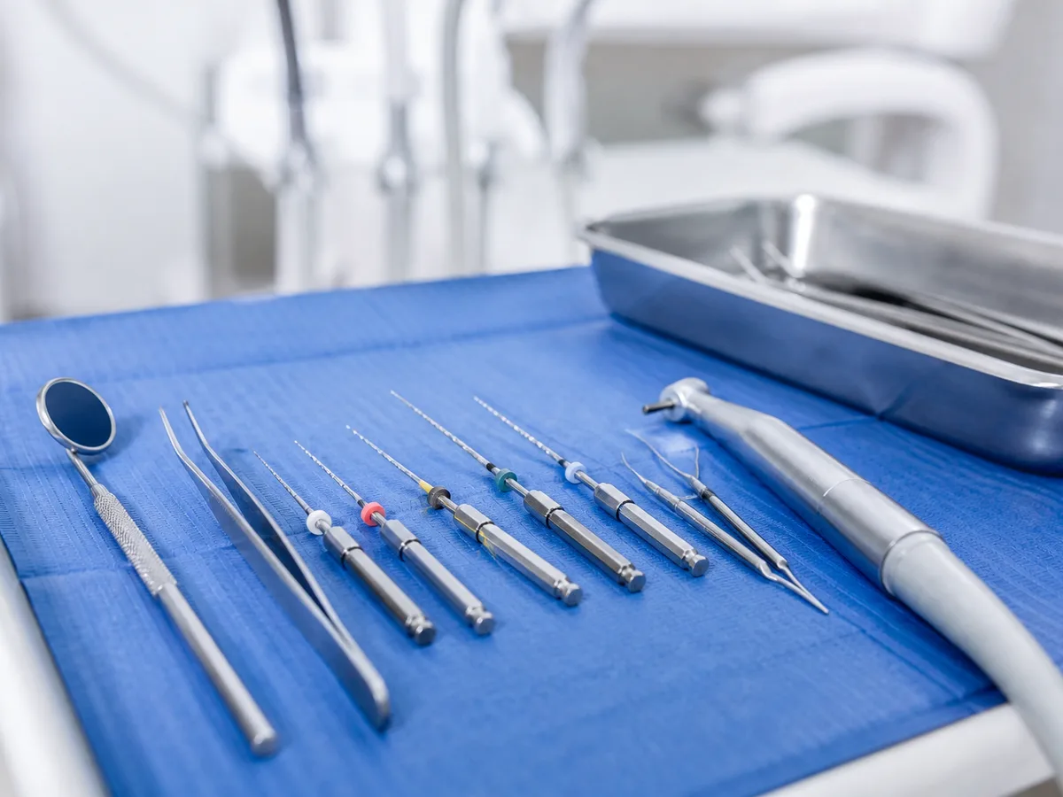 Clean root canal setup with dental dam and sterile instruments