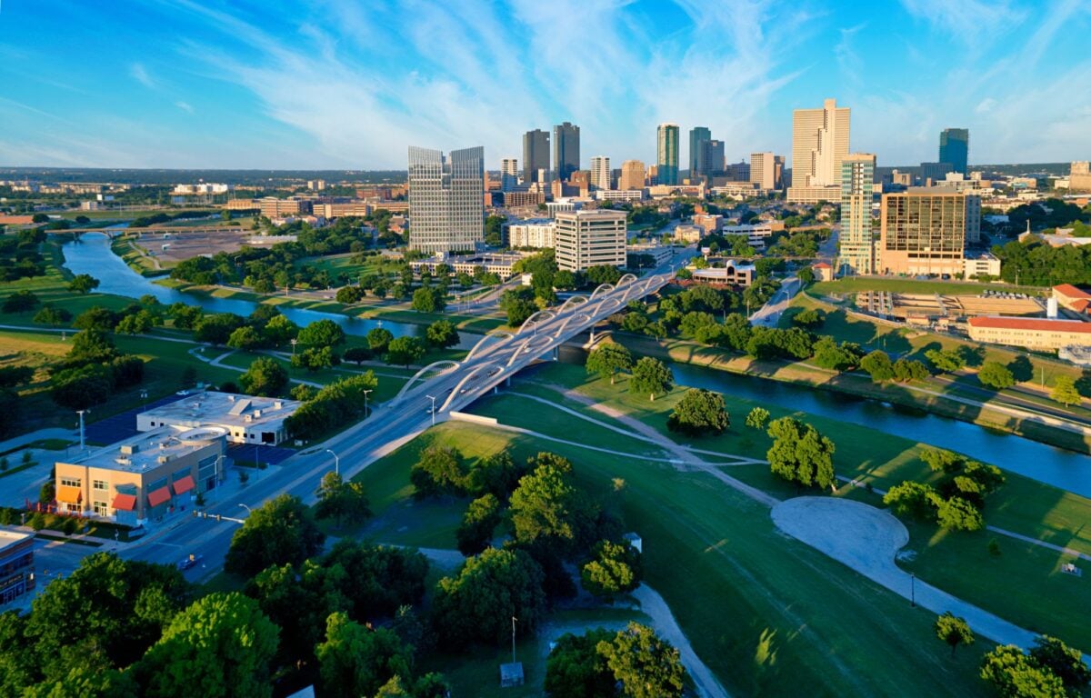 Aerial view of downtown Ft Worth Texas during the day with Trinity River in the foreground