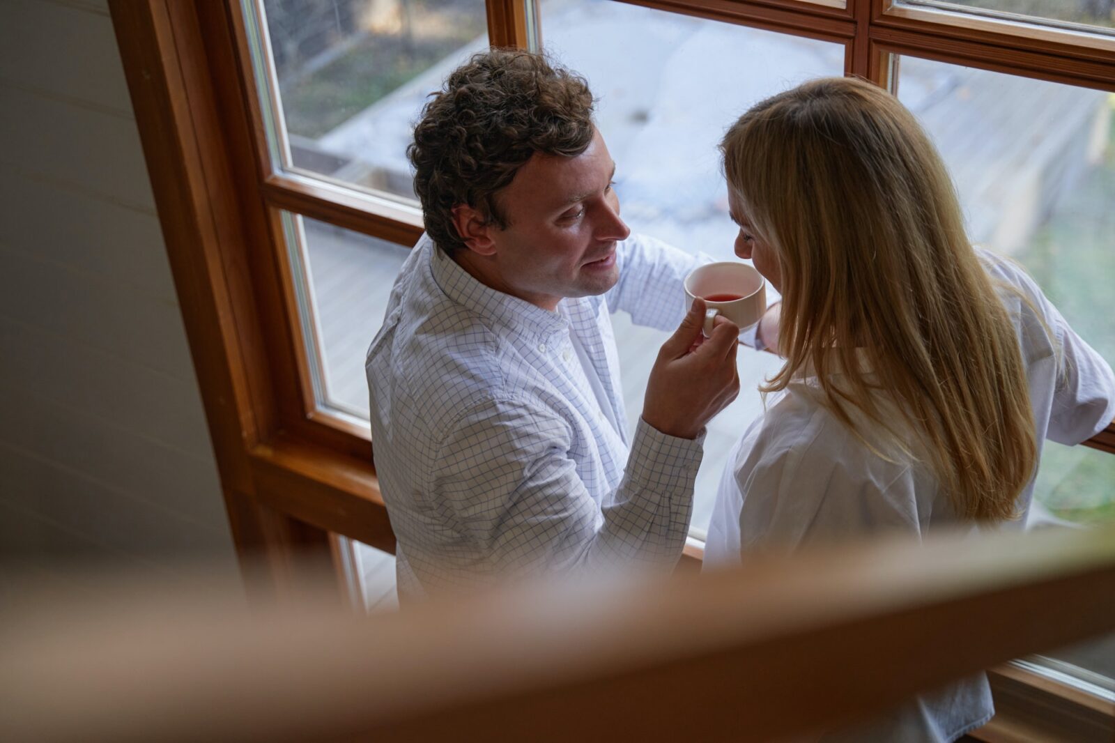 Close up of loving couple enjoying aroma tea