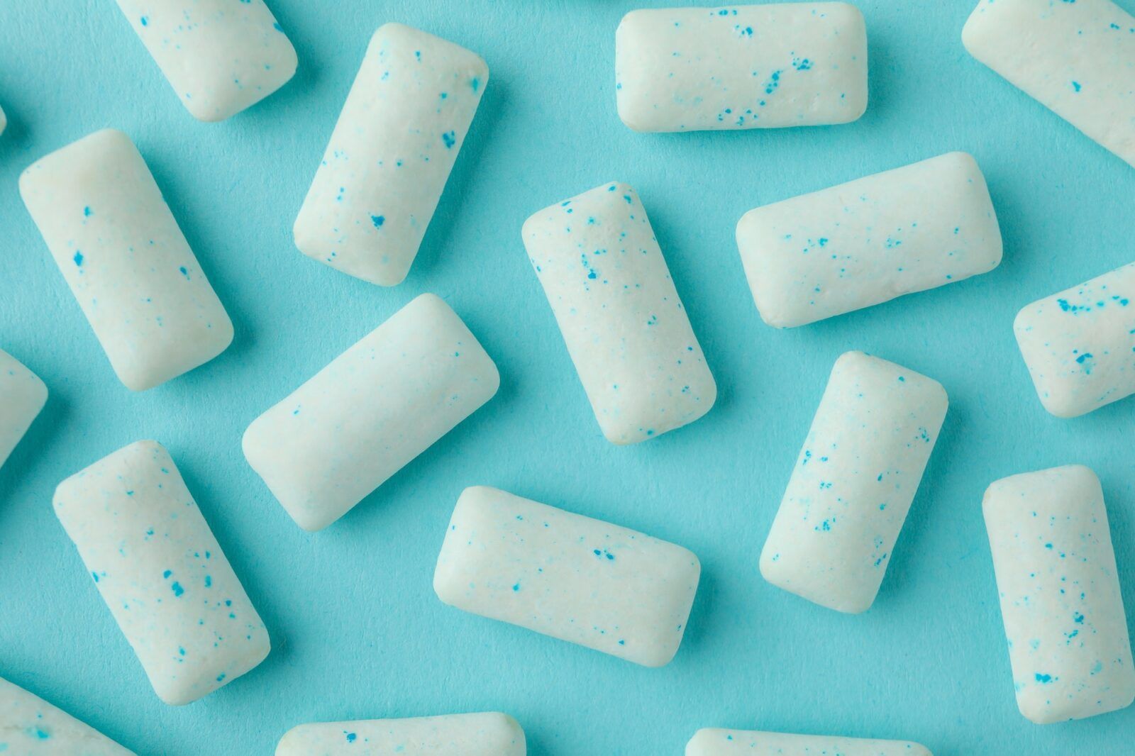 Chewing or bubble gum on blue background