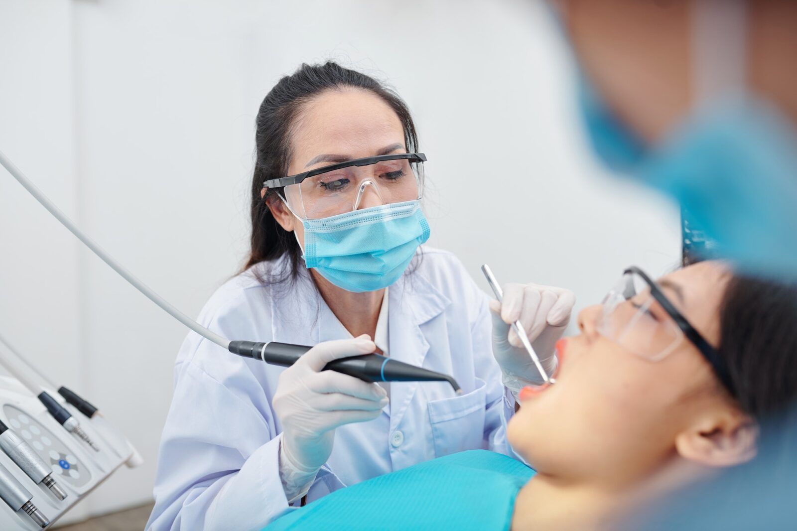 Dentist treating cavity