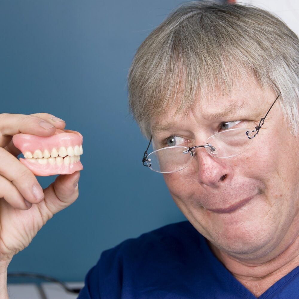 Man and his dentures
