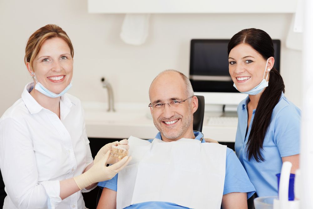 patient dentist and assistant