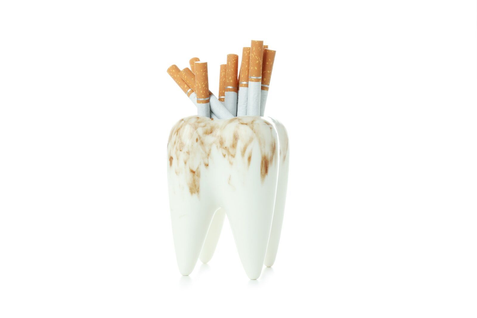 Concept of harm of smoking for teeth, isolated on white background