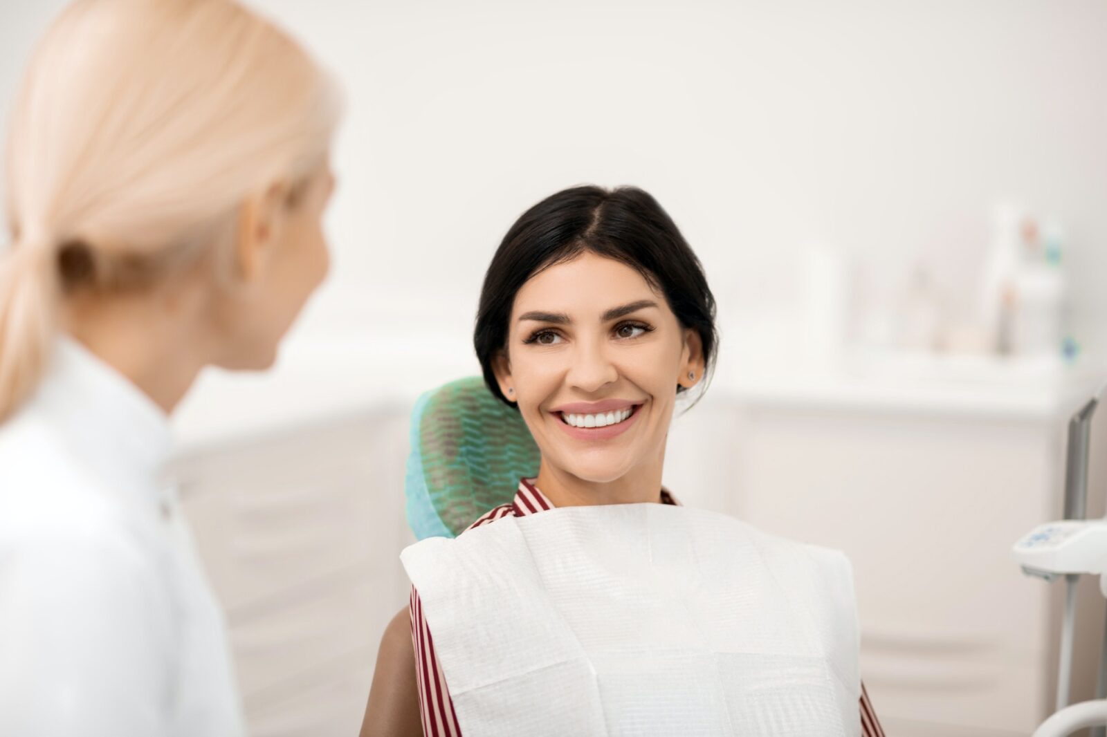 Woman being happy at her future teeth whitening