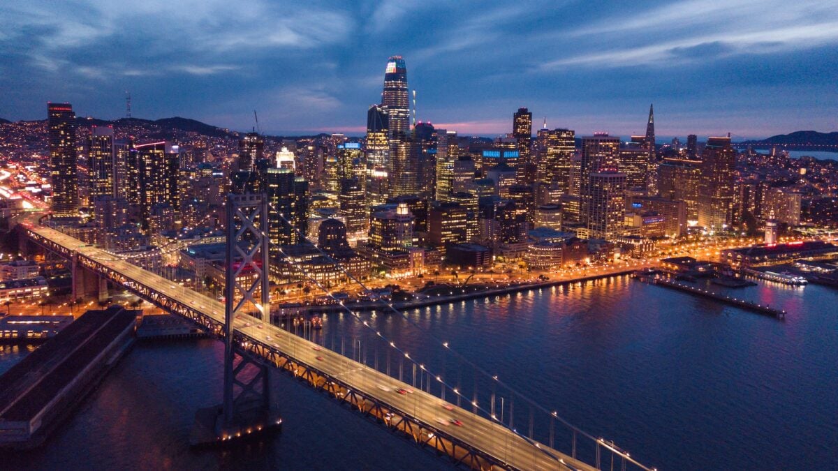 Aerial Cityscape view of San Francisco and the Bay Bridge at Nig