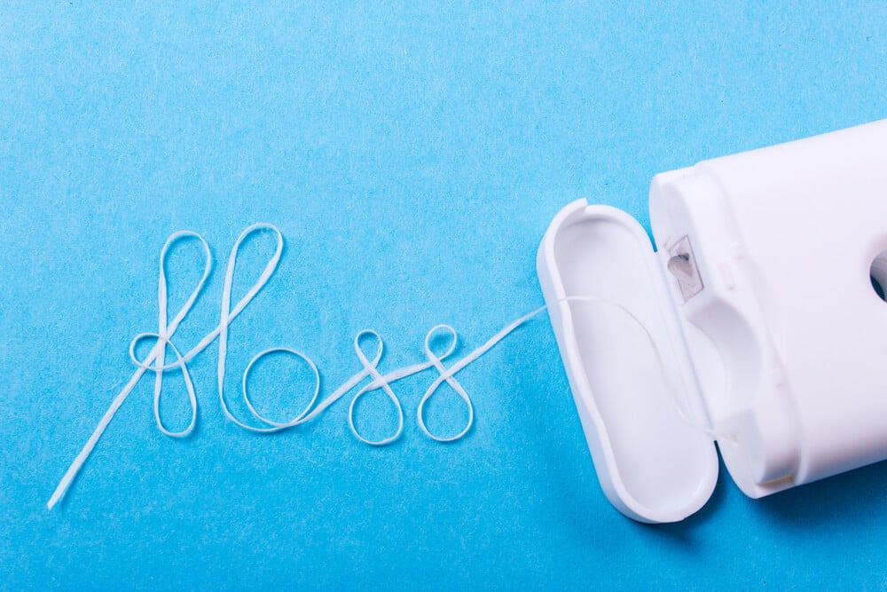 dental floss spelling the word floss