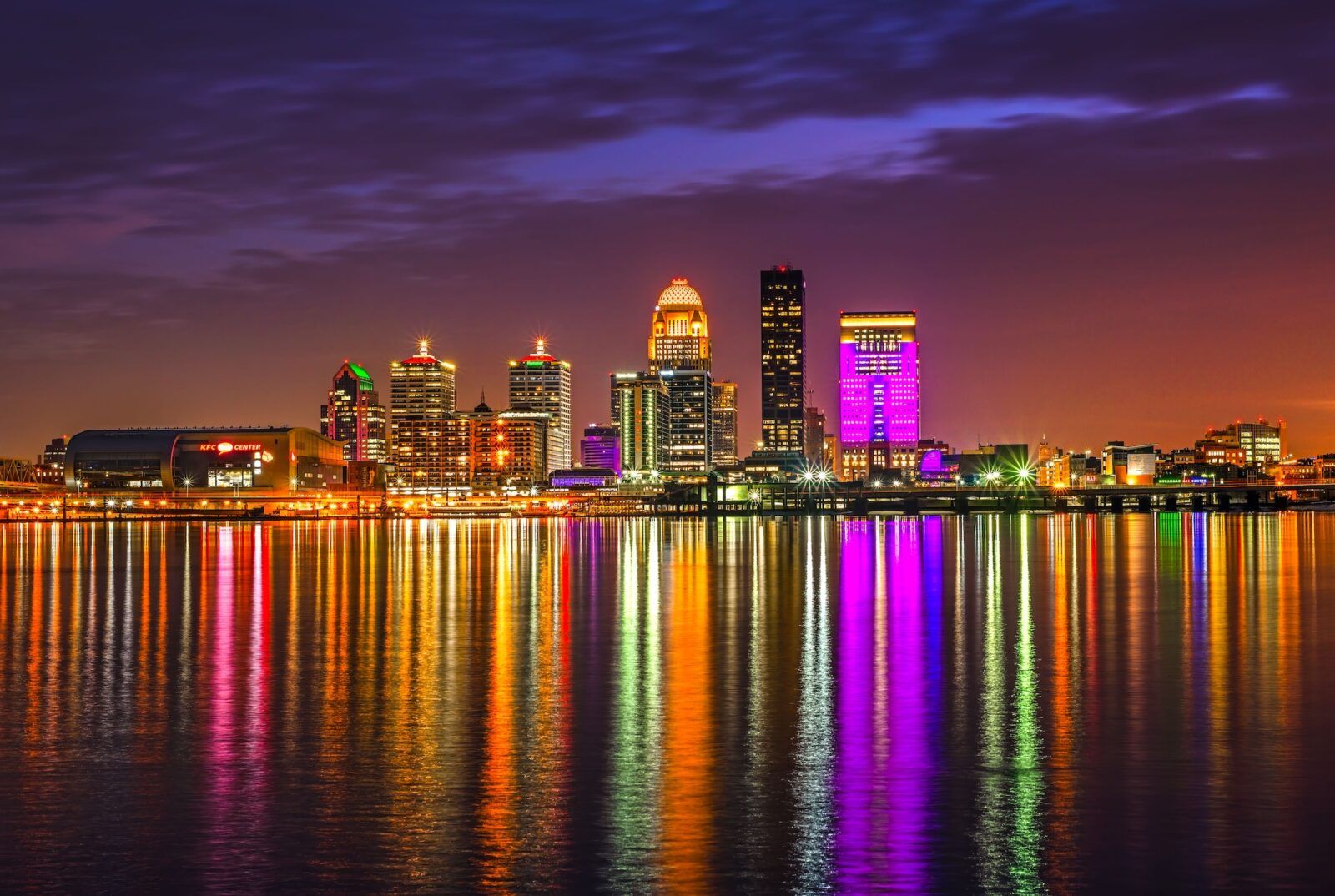 Long exposure shot of night buildings lights reflecting on the water in Louisville, Kentucky, USA