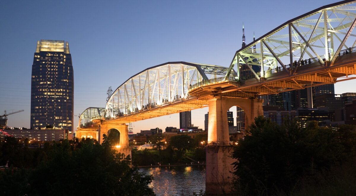 People Walk Across Cumberland River Pedestrian Bridge Nashville