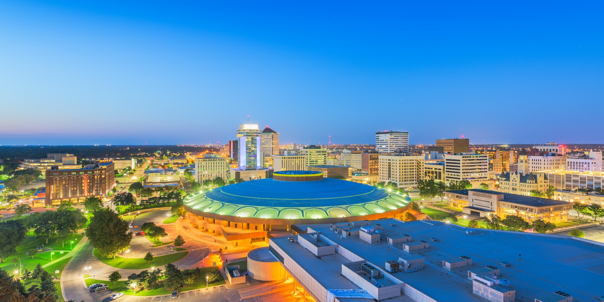 Wichita, Kansas, USA downtown skyline at dusk.