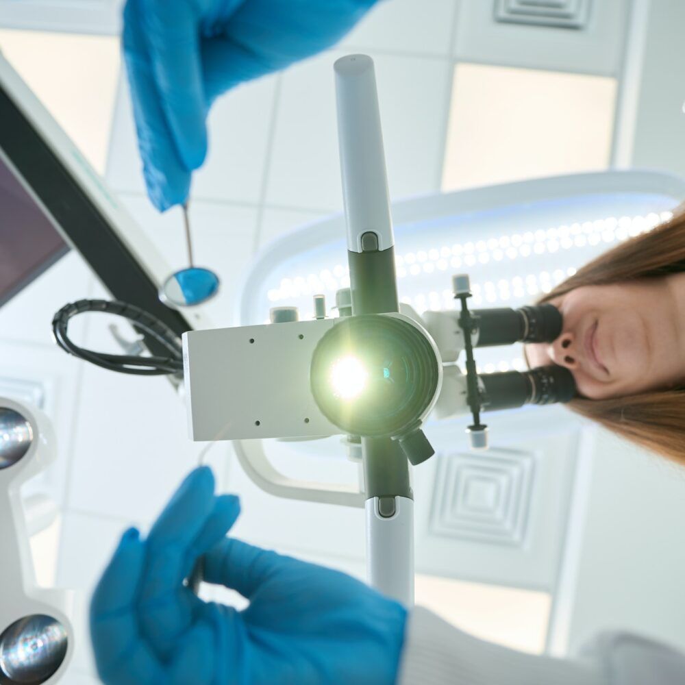 High-tech endodontic equipment including microscope