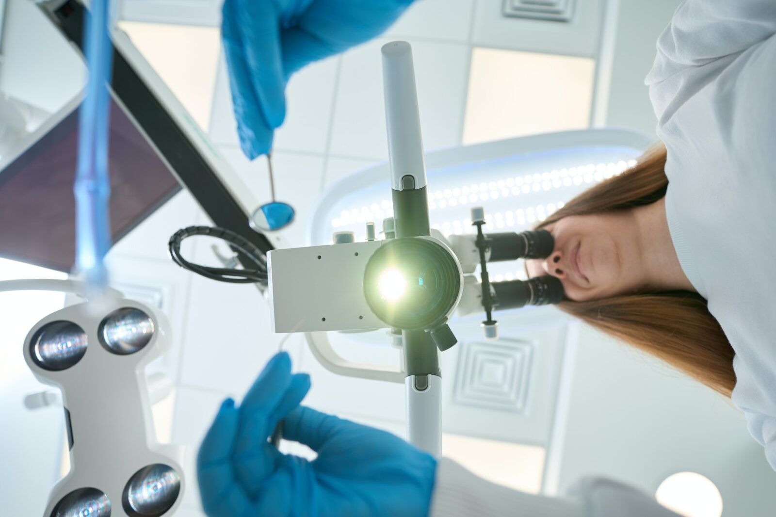 High-tech endodontic equipment including microscope