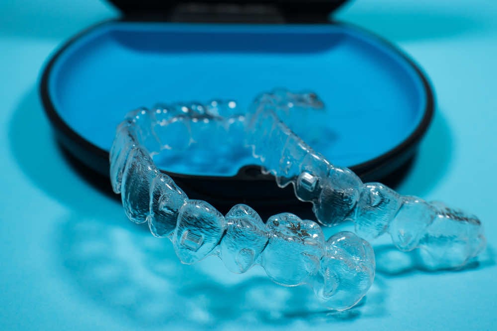 clear aligners in container